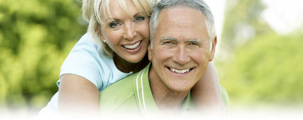 Smiling Greenwich mature couple family dentist
